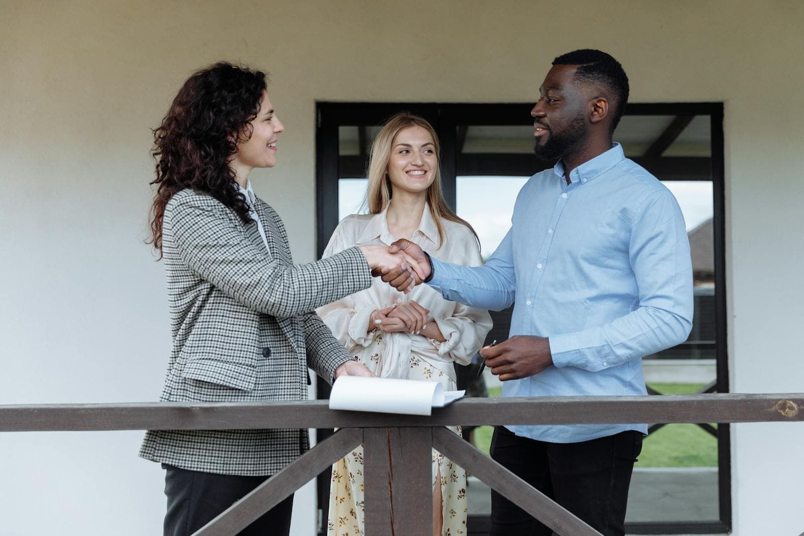 An Ontario landlord handing over keys after a lease is signed on Nest Mate